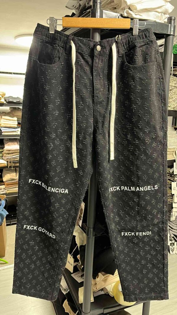 גינס עם כיתוב 'ספרקל' DARK BLACK AND GRAY